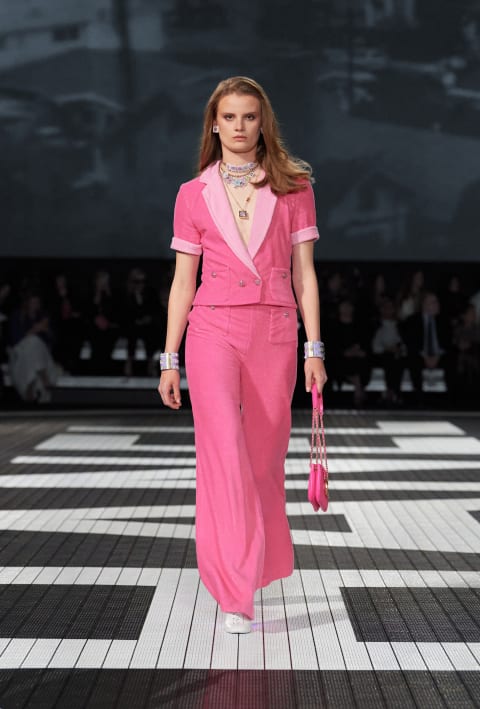 An example of a Barbie-inspired look presented by Chanel for their womenswear 2024 Resort Collection.