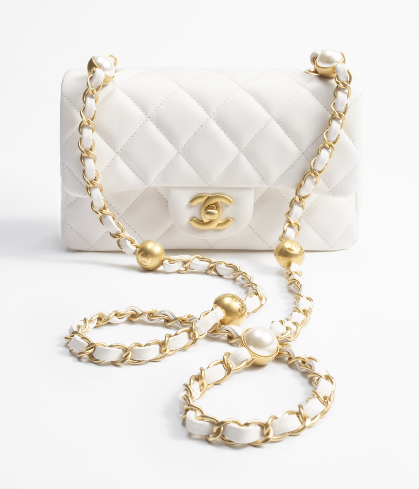 Chanel white mini flap bag 2025