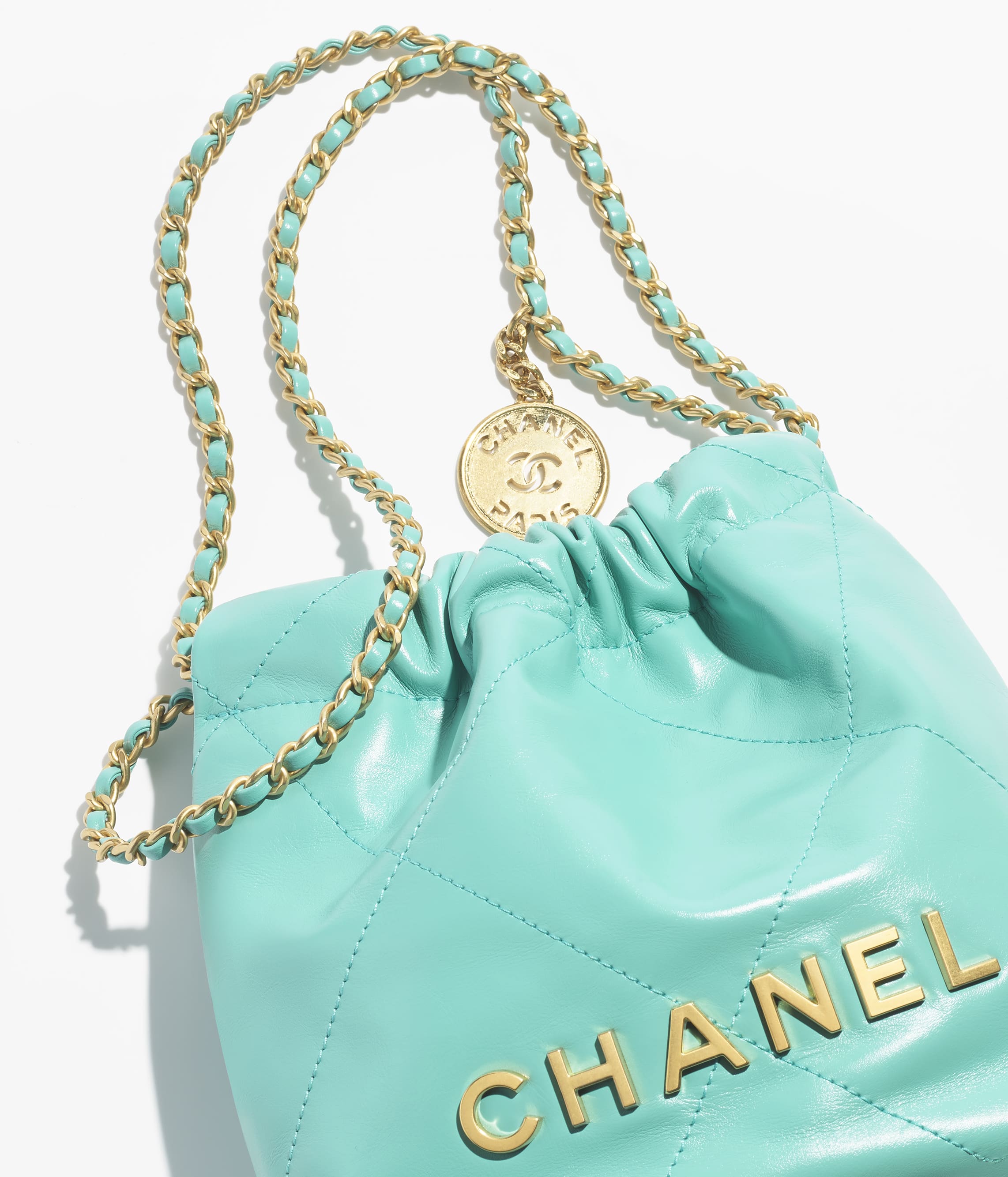 Chanel 22 mini handbag, Shiny calfskin & gold-tone metal , turquoise —  Fashion